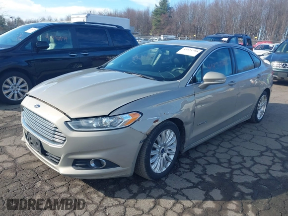 2015 Ford Fusion SE Hybrid with VIN 3FA6P0LUXFR133979, listed as a IAAI auction lot 41831288 with 143,738 mi miles. Bid and sale history available at carsss.com. Image 2.