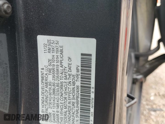 2023 Honda Odyssey Touring with VIN 5FNRL6H86PB024066, listed as a Copart auction lot 58414575 with 29,827 mi miles and Salvage title. Bid and sale history available at DreamBid. Image 13.