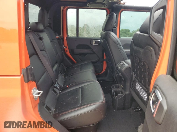 2023 Jeep Gladiator Rubicon FarOut z VIN 1C6JJTBM8PL587129, wystawiony jako Copart lot #53805935 z przebiegiem 46 790 mil mil oraz Szkoda całkowita • Salvage title. Historia ofert i sprzedaży dostępna na DreamBid. Obrazek 10.