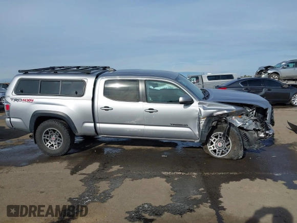 2021 Toyota Tacoma 4WD SR5 with VIN 3TMDZ5BN1MM105694, listed as a IAAI auction lot 41233853 with 1 mi miles. Bid and sale history available at carsss.com. Image 13.