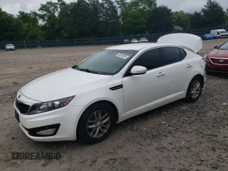 2013 Kia Optima LX z VIN KNAGM4A77D5310061, wystawiony jako Copart lot #58205065 z przebiegiem 147 821 mil mil oraz Szkoda całkowita • Salvage title. Historia ofert i sprzedaży dostępna na DreamBid. Obrazek 1.
