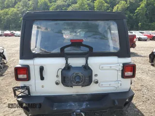 2023 Jeep Wrangler Sport with VIN 1C4HJXDGXPW596127, listed as a Copart auction lot 65395655 with 64,257 mi miles and Salvage title. Bid and sale history available at DreamBid. Image 6.