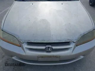 1999 Honda Accord LX with VIN JHMCG5642XC003361, listed as a IAAI auction lot 42270009 with 160,706 mi miles and . Bid and sale history available at DreamBid. Image 6.