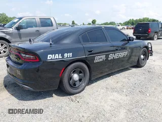 2021 Dodge Charger Police z VIN 2C3CDXAT7MH523170, wystawiony jako IAAI lot #42322244 z przebiegiem 90 825 mil mil oraz . Historia ofert i sprzedaży dostępna na DreamBid. Obrazek 4.