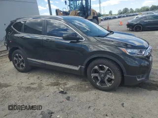 2017 Honda CR-V Touring with VIN 5J6RW1H93HL003929, listed as a Copart auction lot 53295705 with 67,097 mi miles and Salvage Title. Bid and sale history available at carsss.com. Image 4.