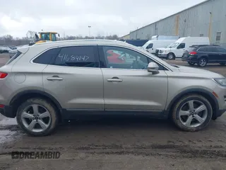 2015 Lincoln MKC with VIN 5LMCJ1A96FUJ30579, listed as a IAAI auction lot 41684147 with 144,364 mi miles and . Bid and sale history available at DreamBid. Image 13.