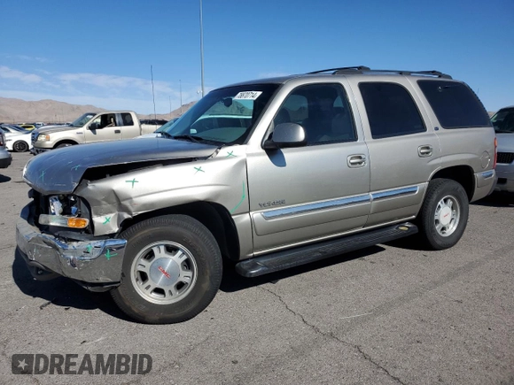 2000 GMC Yukon SLT with VIN 1GKEK13T2YJ147751, listed as a Copart auction lot 78870714 with 237,559 mi miles and Salvage Title. Bid and sale history available at carsss.com. Image 1.