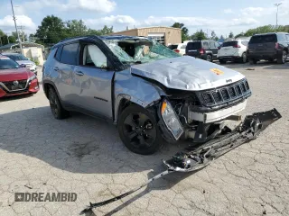2018 Jeep Compass Altitude with VIN 3C4NJCBB2JT407423, listed as a Copart auction lot 65131134 with 66,605 mi miles and Salvage title. Bid and sale history available at DreamBid. Image 4.