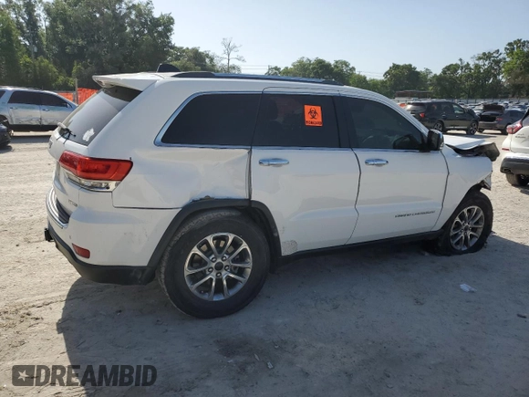 2014 Jeep Grand Cherokee Limited with VIN 1C4RJFBG6EC155269, listed as a Copart auction lot 56979205 with 151,191 mi miles and Salvage title. Bid and sale history available at DreamBid. Image 3.