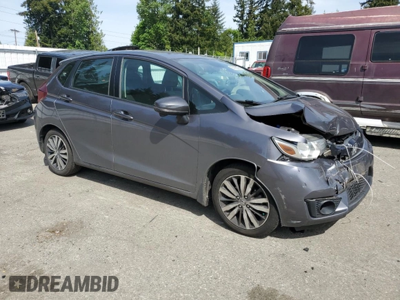 2015 Honda Fit EX-L with VIN 3HGGK5H80FM767970, listed as a Copart auction lot 55866075 with 64,435 mi miles and Salvage Title. Bid and sale history available at DreamBid. Image 4.