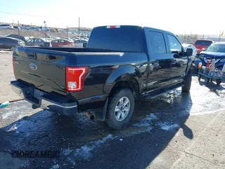 2015 Ford F-150 XLT with VIN 1FTEW1EP0FFC39327, listed as a IAAI auction lot 41012296 with 198,611 mi miles. Bid and sale history available at carsss.com. Image 4.