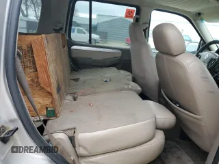 2003 Mercury Mountaineer Convenience z VIN 4M2ZU86K93UJ11852, wystawiony jako Copart lot #89218085 z przebiegiem 241 814 mil mil oraz Szkoda całkowita • Salvage title. Historia ofert i sprzedaży dostępna na DreamBid. Obrazek 11.