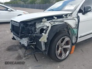 2022 Bentley Bentayga V8 z VIN SJAAM2ZV2NC013035, wystawiony jako IAAI lot #41487773 z przebiegiem 35 500 mil mil oraz . Historia ofert i sprzedaży dostępna na DreamBid. Obrazek 6.