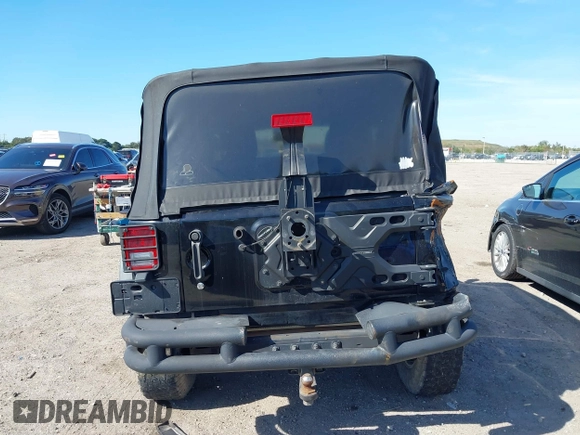 2016 Jeep Wrangler Willys Wheeler z VIN 1C4AJWAG9GL257621, wystawiony jako IAAI lot #41432306 z przebiegiem 84 248 mil mil oraz . Historia ofert i sprzedaży dostępna na DreamBid. Obrazek 16.