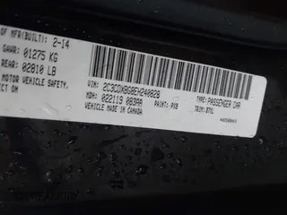 2014 Dodge Charger SE with VIN 2C3CDXBG8EH240828, listed as a IAAI auction lot 42158404 with 211,686 mi miles and . Bid and sale history available at DreamBid. Image 9.