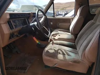 1986 Ford Bronco Custom with VIN 1FMEU15H7GLB19165, listed as a Copart auction lot 71802554 with 81,444 mi miles and Salvage Title. Bid and sale history available at carsss.com. Image 7.
