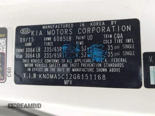 2016 Kia Sedona L with VIN KNDMA5C12G6151168, listed as a IAAI auction lot 42117087 with 99,743 mi miles. Bid and sale history available at carsss.com. Image 9.