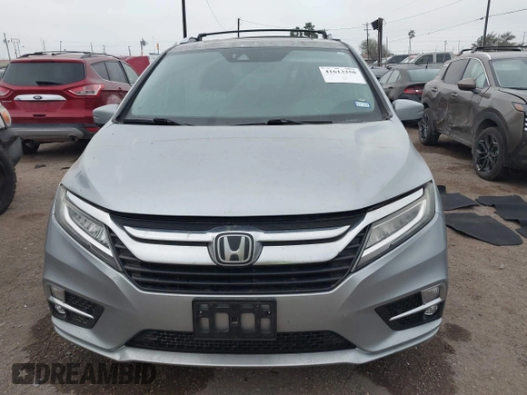 2019 Honda Odyssey Elite with VIN 5FNRL6H94KB109442, listed as a IAAI auction lot 41613350 with 75,986 mi miles and . Bid and sale history available at DreamBid. Image 12.