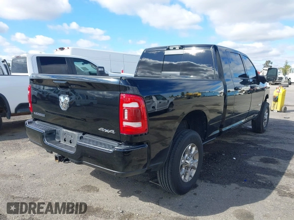 2024 Ram 2500 Laramie with VIN 3C6UR5NL2RG161490, listed as a IAAI auction lot 41688136 with 10,597 mi miles and . Bid and sale history available at DreamBid. Image 4.