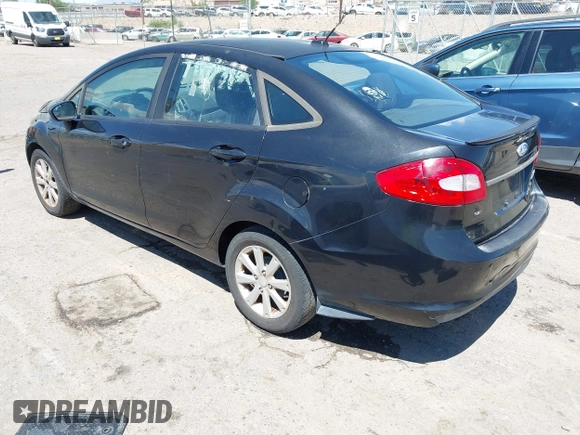 2011 Ford Fiesta SE z VIN 3FADP4BJ6BM121924, wystawiony jako IAAI lot #42453787 z przebiegiem 153 691 mil mil oraz . Historia ofert i sprzedaży dostępna na DreamBid. Obrazek 3.