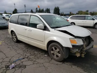 2010 Dodge Grand Caravan SXT with VIN 2D4RN5D11AR331804, listed as a Copart auction lot 73735873 with 183,923 mi miles and Salvage Title. Bid and sale history available at DreamBid. Image 4.