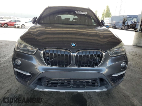2016 BMW X1 xDrive28i with VIN WBXHT3Z38G4A49061, listed as a Copart auction lot 54010455 with 120,875 mi miles and Salvage Title. Bid and sale history available at DreamBid. Image 5.