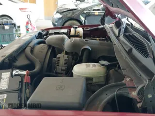 2004 GMC Sierra 1500 SLE z VIN 2GTEK13T641428743, wystawiony jako IAAI lot #42582935 z przebiegiem 230 805 mil mil oraz . Historia ofert i sprzedaży dostępna na DreamBid. Obrazek 22.