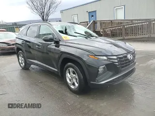 2023 Hyundai Tucson SEL with VIN 5NMJBCAE2PH270674, listed as a Copart auction lot 82879614 with 11,673 mi miles and Salvage Title. Bid and sale history available at DreamBid. Image 14.