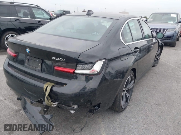 2021 BMW 3 Series 330i with VIN 3MW5R1J07M8B89836, listed as a IAAI auction lot 41860987 with 39,247 mi miles. Bid and sale history available at carsss.com. Image 4.