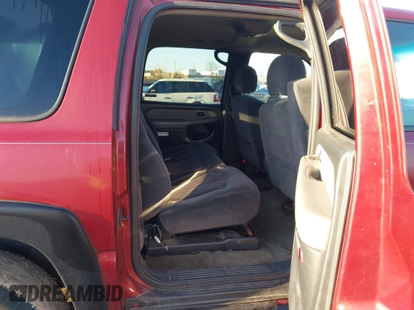 2002 Chevrolet Suburban LT z VIN 1GNFK16Z42J184265, wystawiony jako IAAI lot #41721855 z przebiegiem 227 772 mil mil oraz . Historia ofert i sprzedaży dostępna na DreamBid. Obrazek 8.
