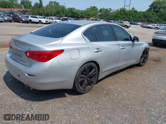 2015 Infiniti Q50 with VIN JN1BV7AP6FM354690, listed as a IAAI auction lot 42410614 with 98,527 mi miles and . Bid and sale history available at DreamBid. Image 4.