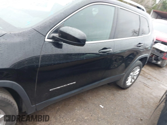 2019 Jeep Cherokee Latitude with VIN 1C4PJLCB4KD220229, listed as a IAAI auction lot 41179101 with 63,099 mi miles and . Bid and sale history available at DreamBid. Image 14.