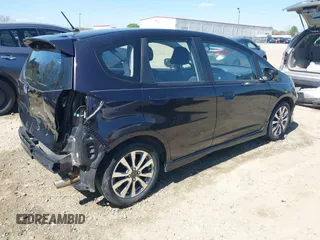 2013 Honda Fit Sport with VIN JHMGE8H59DC001939, listed as a IAAI auction lot 41885102 with 113,639 mi miles. Bid and sale history available at carsss.com. Image 4.