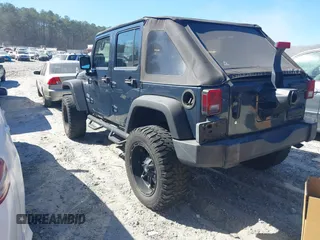 2008 Jeep Wrangler Unlimited X with VIN 1J4GB39138L589300, listed as a IAAI auction lot 41671690 with Not Provided miles and . Bid and sale history available at DreamBid. Image 3.