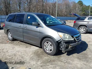 2007 Honda Odyssey EX-L z VIN 5FNRL38707B064035, wystawiony jako IAAI lot #41599021 z przebiegiem Nie podano mil oraz . Historia ofert i sprzedaży dostępna na DreamBid. Obrazek 1.