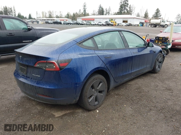2023 Tesla Model 3 Long Range with VIN 5YJ3E1EB5PF704463, listed as a IAAI auction lot 41916627 with 14,305 mi miles and . Bid and sale history available at DreamBid. Image 4.