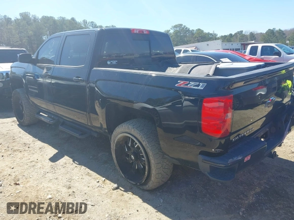 2017 Chevrolet Silverado 1500 LT with VIN 3GCUKREC1HG358752, listed as a IAAI auction lot 41775110 with 150,528 mi miles and . Bid and sale history available at DreamBid. Image 3.