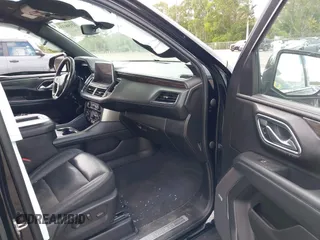 2022 Chevrolet Suburban LT z VIN 1GNSCCKD2NR201474, wystawiony jako IAAI lot #42150033 z przebiegiem 157 659 mil mil oraz . Historia ofert i sprzedaży dostępna na DreamBid. Obrazek 5.
