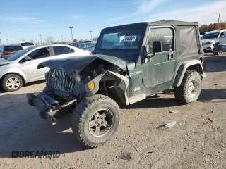 2002 Jeep Wrangler SE with VIN 1J4FA29P72P723223, listed as a Copart auction lot 80833004 with Not Provided miles and Salvage Title. Bid and sale history available at carsss.com. Image 1.