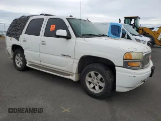 2005 GMC Yukon Denali z VIN 1GKEK63UX5J194771, wystawiony jako Copart lot #53170035 z przebiegiem 175 910 mil mil oraz Tytuł czysty. Historia ofert i sprzedaży dostępna na DreamBid. Obrazek 4.