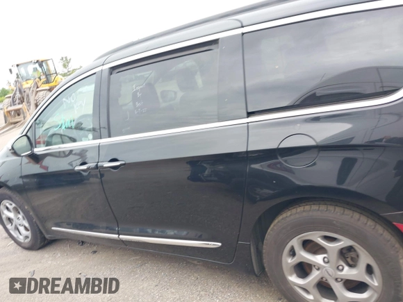 2023 Chrysler Pacifica Limited with VIN 2C4RC1GGXPR552354, listed as a IAAI auction lot 42275090 with 69,144 mi miles and . Bid and sale history available at DreamBid. Image 14.