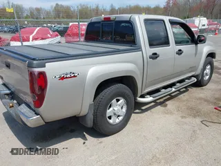 2004 GMC Canyon 1SB SLE Z85 with VIN 1GTDT136848196663, listed as a IAAI auction lot 42043079 with 220,904 mi miles. Bid and sale history available at carsss.com. Image 4.