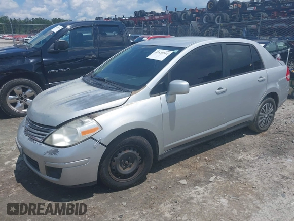 2011 Nissan Versa S with VIN 3N1BC1AP4BL446596, listed as a IAAI auction lot 42425302 with 141,047 mi miles and . Bid and sale history available at DreamBid. Image 2.