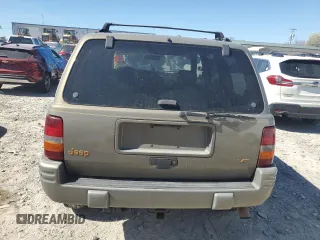 1997 Jeep Grand Cherokee Limited with VIN 1J4GZ78Y4VC567237, listed as a Copart auction lot 49059105 with 177,478 mi miles and Salvage Title. Bid and sale history available at carsss.com. Image 6.
