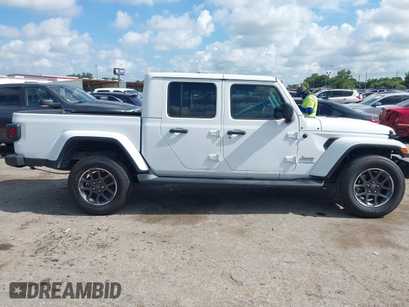 2020 Jeep Gladiator Overland z VIN 1C6HJTFGXLL180622, wystawiony jako IAAI lot #42565601 z przebiegiem 63 738 mil mil oraz . Historia ofert i sprzedaży dostępna na DreamBid. Obrazek 14.
