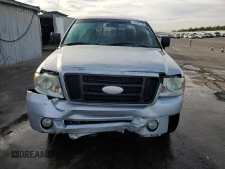 2006 Ford F-150 STX with VIN 1FTRF02W46KA92833, listed as a Copart auction lot 76401174 with 132,603 mi miles and Salvage Title. Bid and sale history available at carsss.com. Image 5.