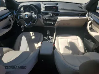 2021 BMW X1 xDrive28i z VIN WBXJG9C07M5S73464, wystawiony jako Copart lot #50374525 z przebiegiem 117 828 mil mil oraz Tytuł czysty. Historia ofert i sprzedaży dostępna na DreamBid. Obrazek 8.