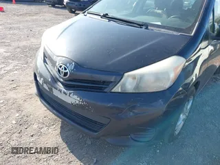 2013 Toyota Yaris L with VIN JTDKTUD35DD548148, listed as a IAAI auction lot 41939847 with 336,231 mi miles. Bid and sale history available at carsss.com. Image 6.