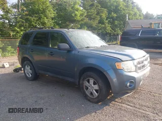 2011 Ford Escape XLT z VIN 1FMCU9D77BKB11600, wystawiony jako IAAI lot #42579732 z przebiegiem 147 247 mil mil oraz . Historia ofert i sprzedaży dostępna na DreamBid. Obrazek 1.