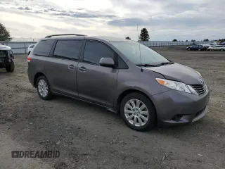 2014 Toyota Sienna LE with VIN 5TDJK3DC7ES073648, listed as a Copart auction lot 50554095 with 136,236 mi miles and Salvage Title. Bid and sale history available at DreamBid. Image 4.